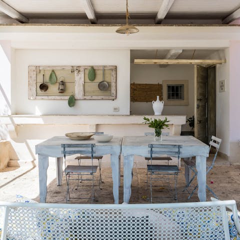 Share magical evenings around the rustic table as the sun sets