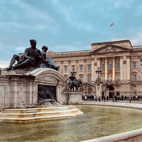 Pay the queen a visit at Buckingham Palace, a thirteen-minute walk away