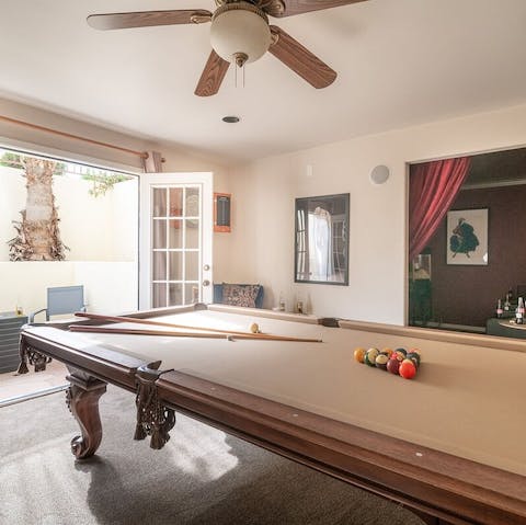 Have a lively game of pool in the elegant games room