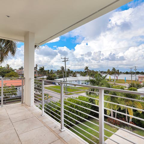 Glimpse the glistening sea from your balcony