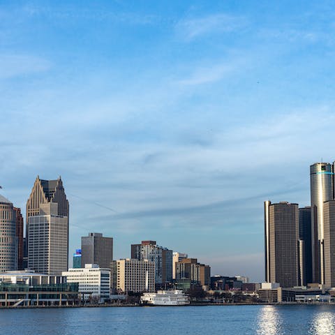 Stroll along the Detroit riverfront, a fifteen-minute walk from your door