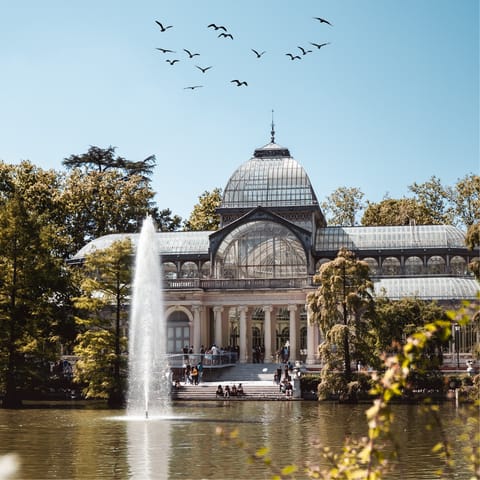 Spend an afternoon strolling through nearby El Retiro Park