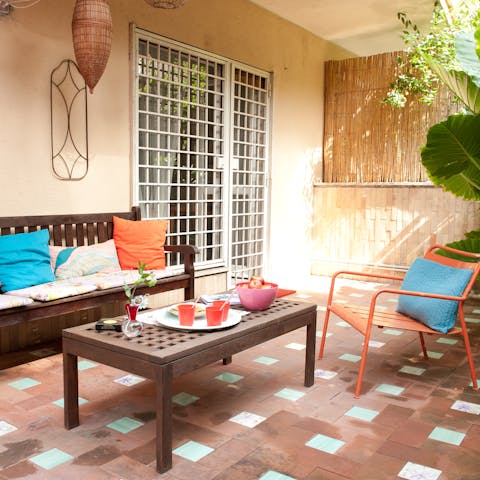 Spend warm afternoons sipping Aperols on the private patio