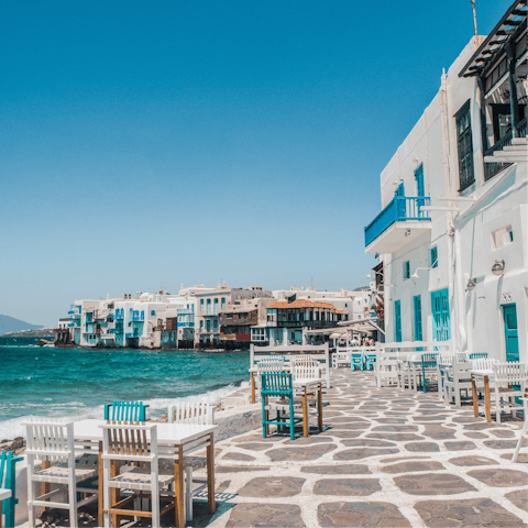 Drive to Mykonos Town for shopping and sea-front cocktails