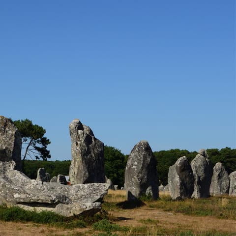 Hop in the car and take a nine-minute drive to the prehistoric Carnac Stones