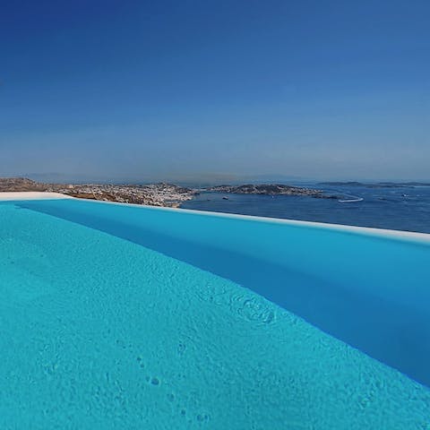 Swim out to the edge of the infinity pool and admire the ocean views
