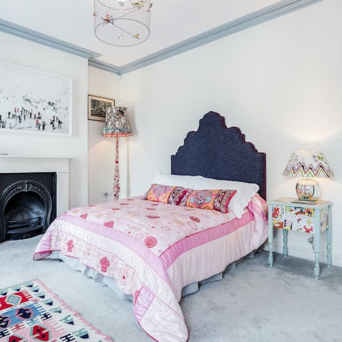 Settle into a deep slumber in the serene bedroom