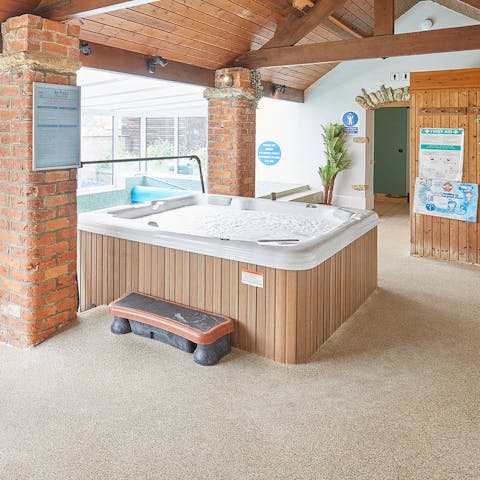 Enjoy a relaxing soak in the shared indoor hot tub