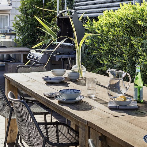 Fire up the barbecue and enjoy a Catalan feast at the roof terrace's table