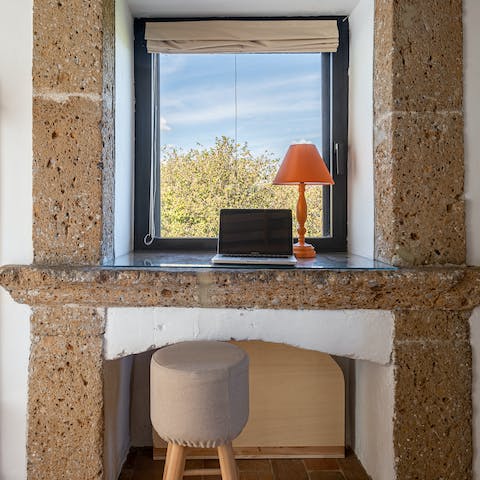 Catch up on emails at the impressive stone desk