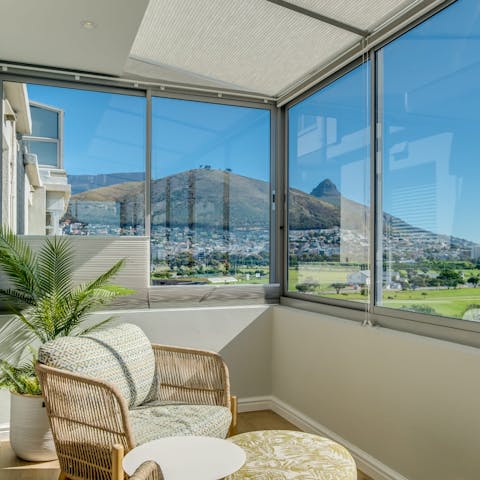 Have the first coffee of the day in the sunny nook of this apartment