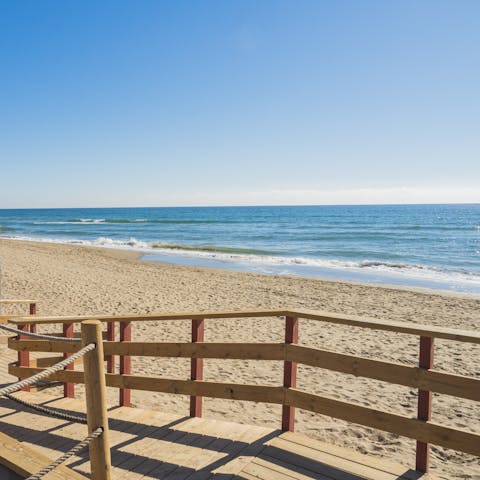 Indulge in a spot of sunbathing at Playa de la Víbora