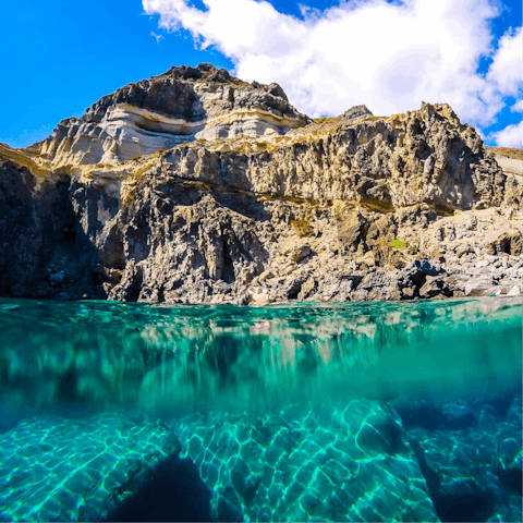 Visit Pantelleria's rocky coastline and underwater caves