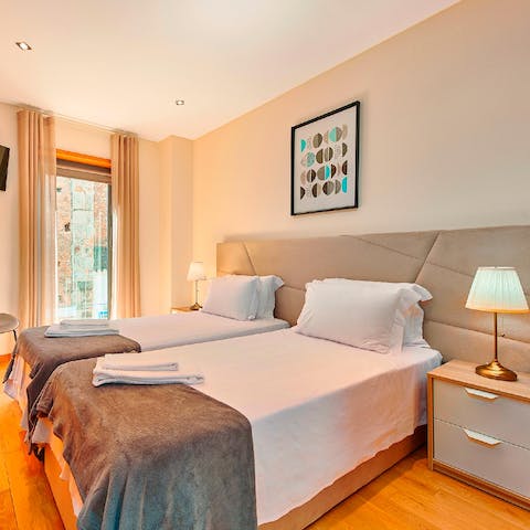 Wake up to views of the neighbouring church from the bedroom's Juliet balcony