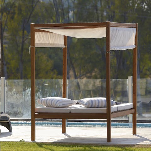 Relax with your favourite book on the outdoor day bed