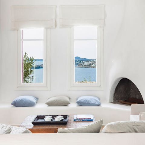 Settle down in the white-washed living room with a glass of wine and admire the views