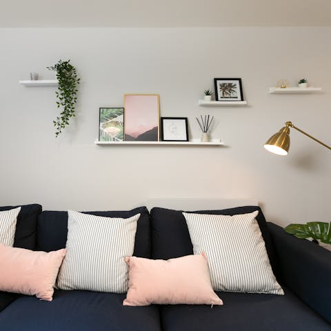 Stay in a stylish space dotted with houseplants and curios