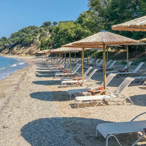 Unwind on a balmy afternoon  at the resort's private beach