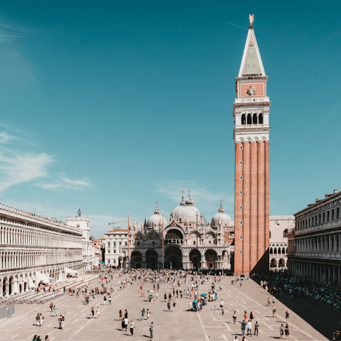 Catch the ferry from San Toma to the famous Piazza San Marco 