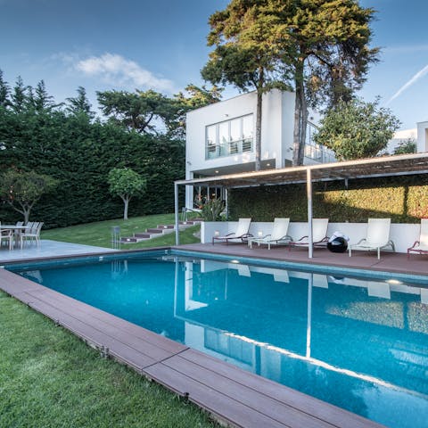 Slip into the sleek swimming pool or lounge in on the shaded terrace