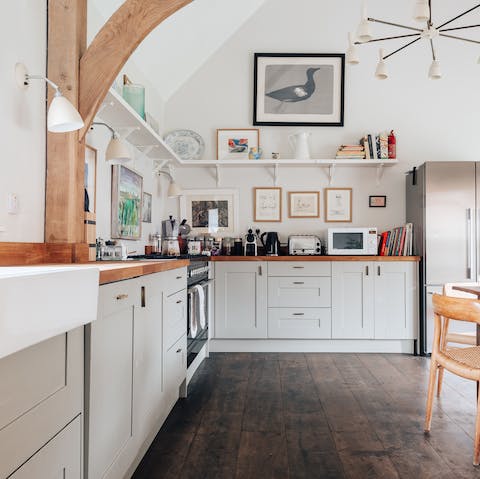 Prepare family meals in the stunning farmhouse-style kitchen