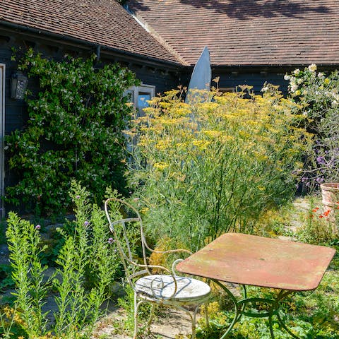 Relax among the wildflowers in the courtyard