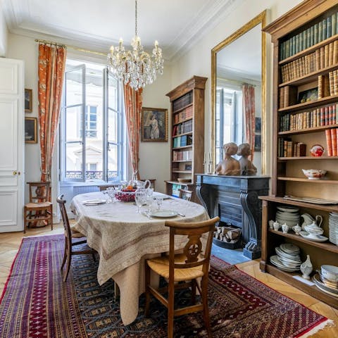 Indulge in a bit of formal dining by the bookcases at home