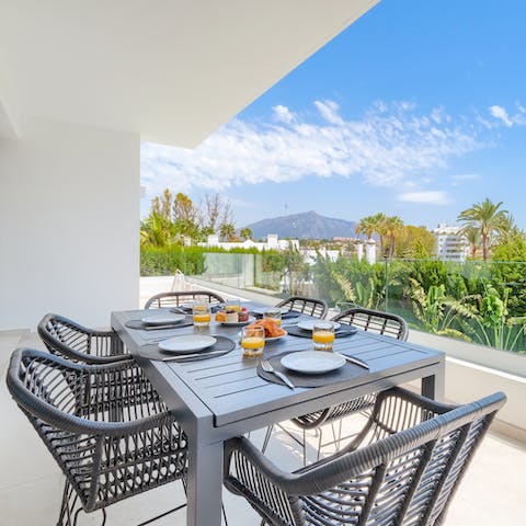 Enjoy the views from the balcony as you enjoy breakfast 