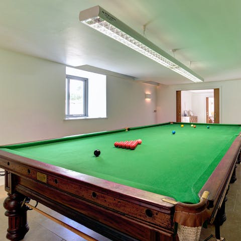 Challenge your guests to a round of snooker in the games room
