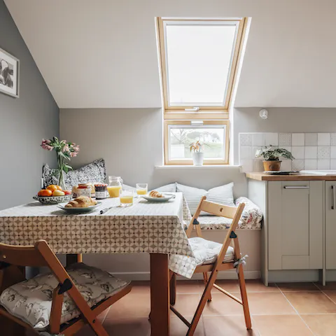Enjoy breakfast with the sun rising through the skylight in the kitchen