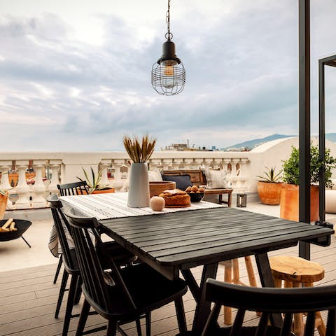 Enjoy alfresco meals on the rooftop terrace