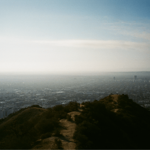 Hike around Runyon Canyon Park and enjoy views across LA