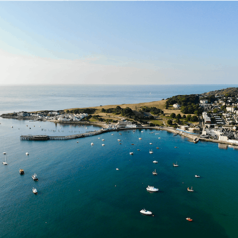 Explore Swanage and its beaches, dramatic scenery, and nostalgic charm