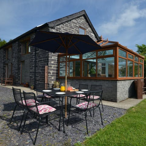 Enjoy a Welsh breakfast out on the terrace