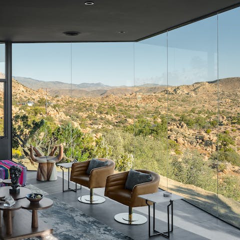 Marvel at the uninterrupted desert panorama from the plentiful floor-to-ceiling windows