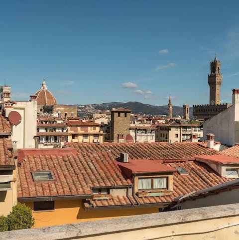 Take in stunning views of the Florence Duomo and the Tower of Palazzo Vecchio from the shared rooftop terrace
