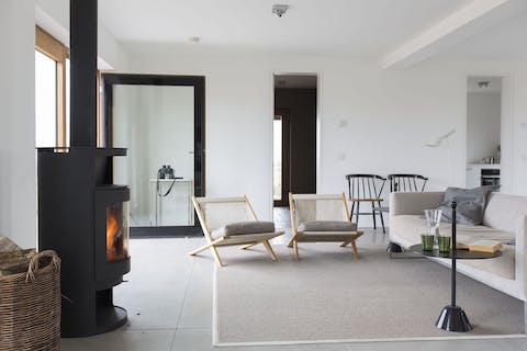 Stay cosy all evening next to the wood-burning stove