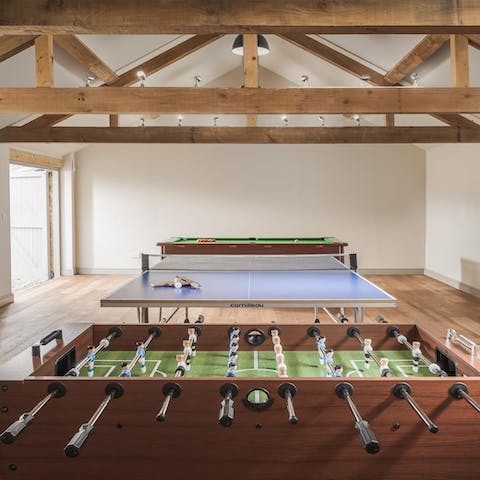Challenge your friends or family to a match in the barn-turned-games-room