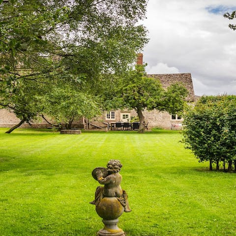 Make the most of the private two acres of grounds that surround the former farmhouse