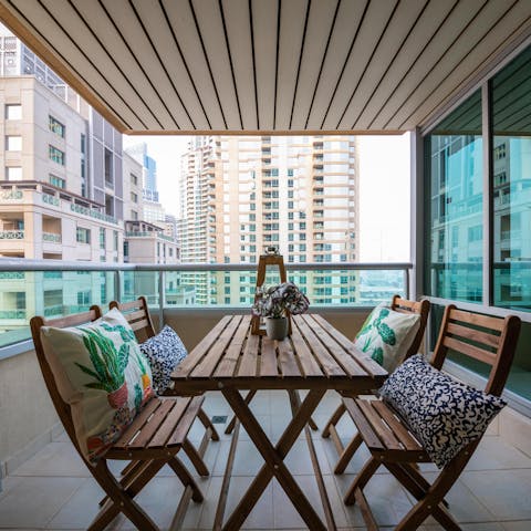 Dine alfresco with incredible cityscape views