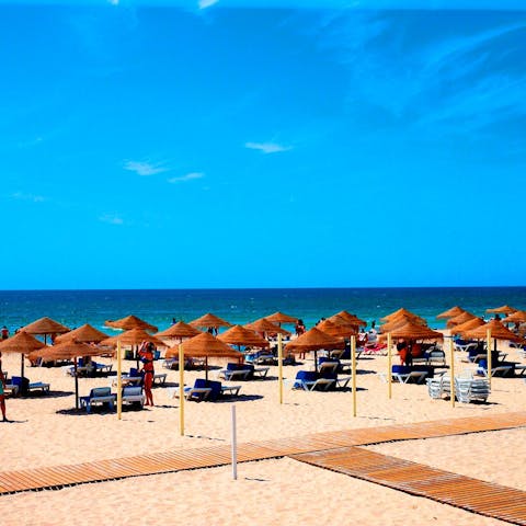 Stroll down to the golden sands of Manta Rota beach and splash about in the Med