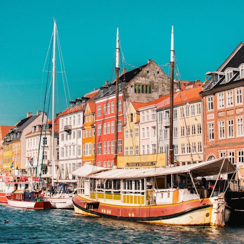 Enjoy a waterside pint in colourful Nyhavn – you can't visit Copenhagen without at least having a drink here