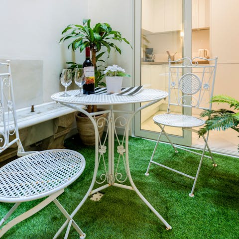 Enjoy a bit of the outdoors, indoors, on the unusual little terrace