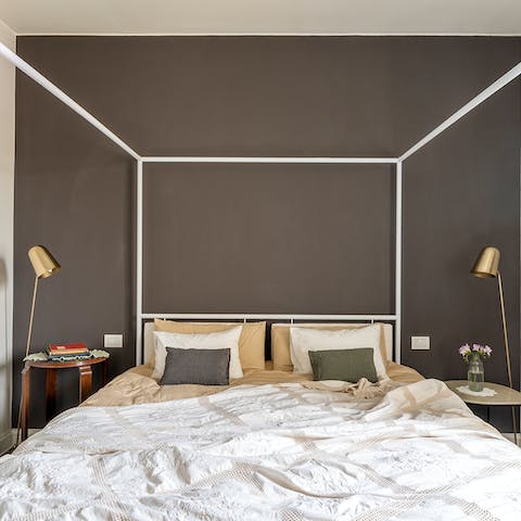 Sleep soundly in the modern four-poster bed
