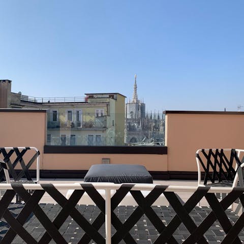 Take in views of the Duomo di Milano from the shared rooftop terrace