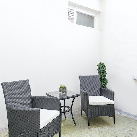 Spend warm evenings out on the apartment's private patio space