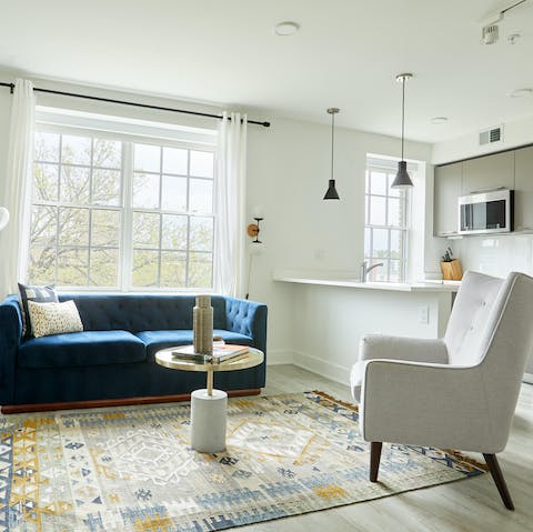 Kick back in the bright living room with a glass of wine after a day of Washington DC sightseeing