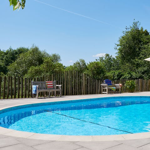 Take a refreshing dip in the outdoor swimming pool