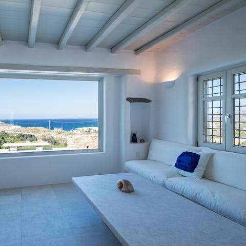 Unwind in the living space and soak up views of the seascape from the sofa