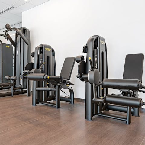 Keep on top of your workout regime in the building's shared gym